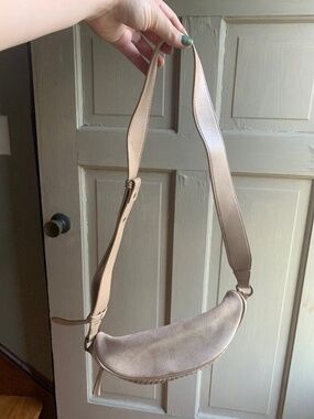Womans Ah-dorned tan belt bag